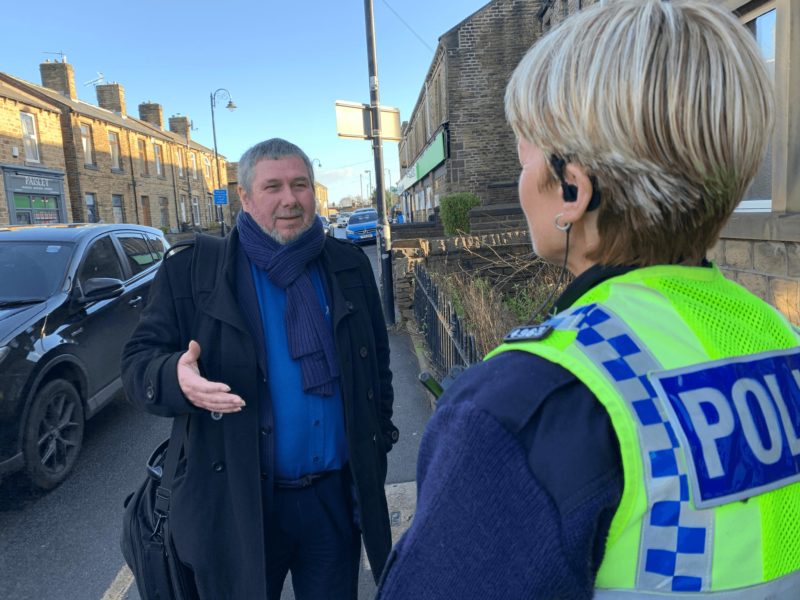 Cllr Graham Turner with a local police officer